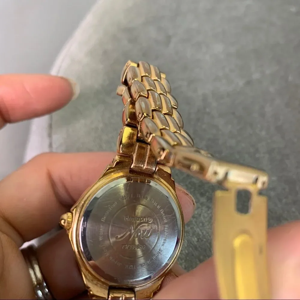 Armitron Now Gold-tone round mother of pearl face Quartz Watch